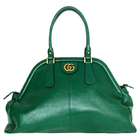 gucci handbags in green leather.